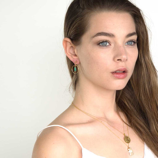 Model wearing Halo Sage Earrings Gold and Turquoise