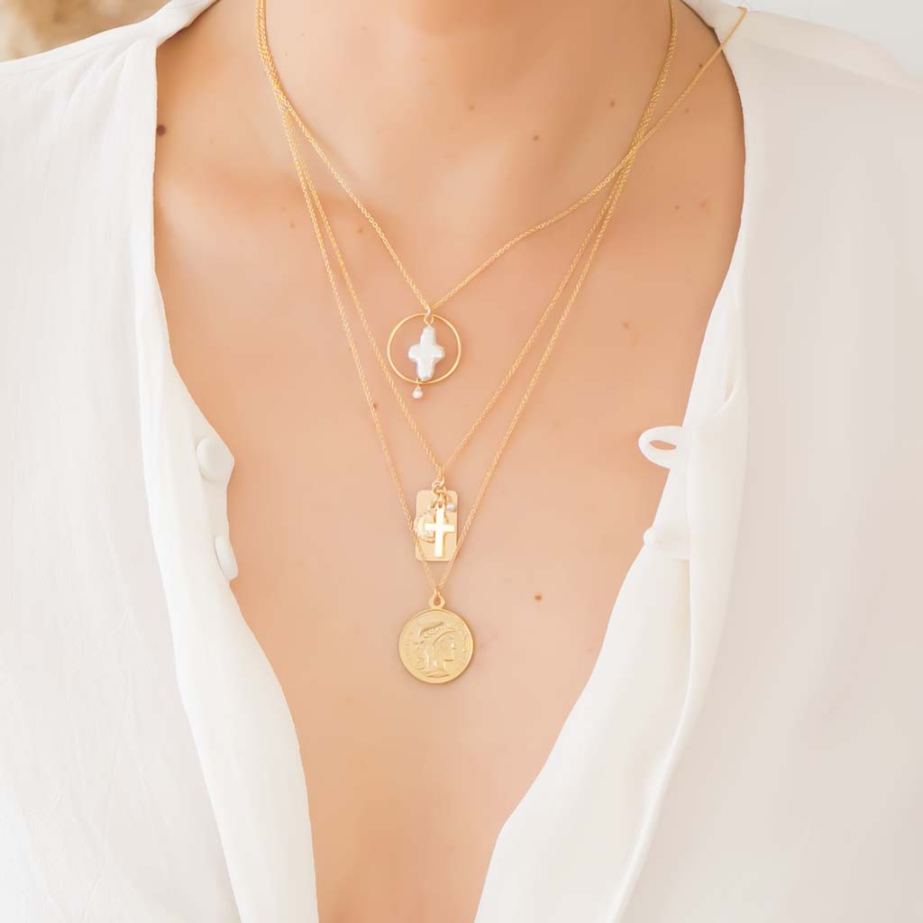 Model wearing Reflections Faith Pearl Necklace Gold styled