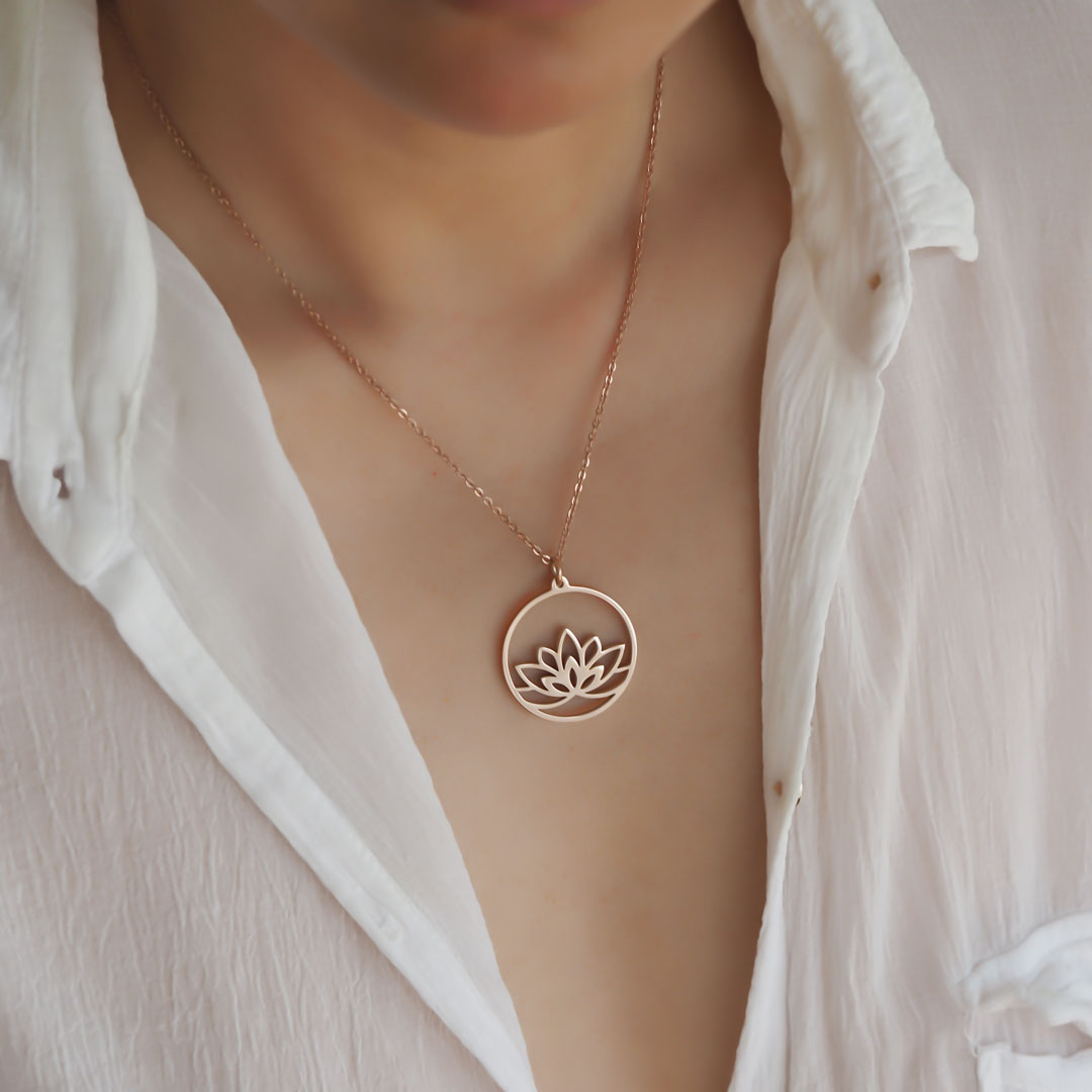 Model wearing Lotus pendant Rose Gold oblique