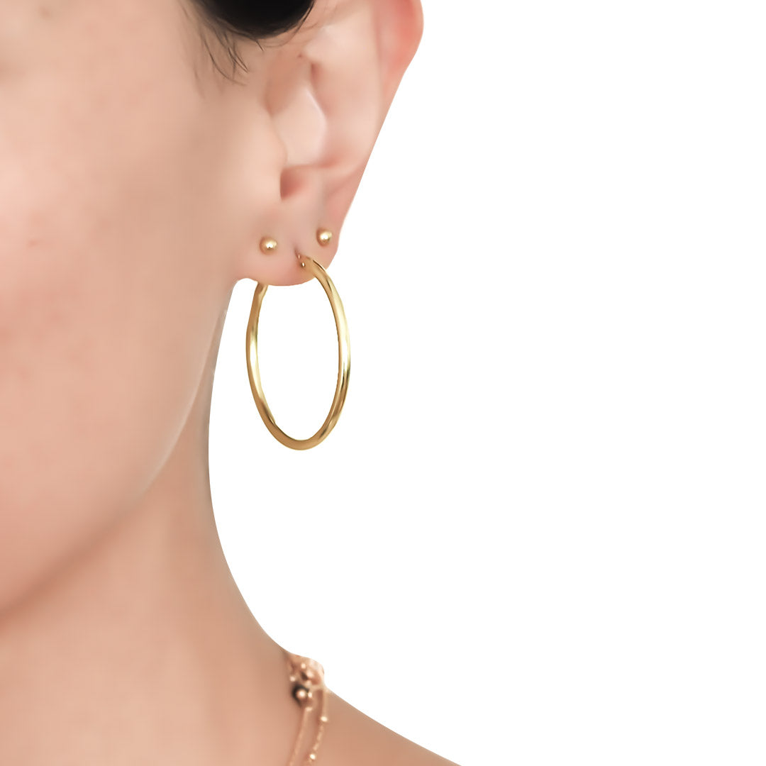 Model wearing Perfect Hoop Earrings - Gold