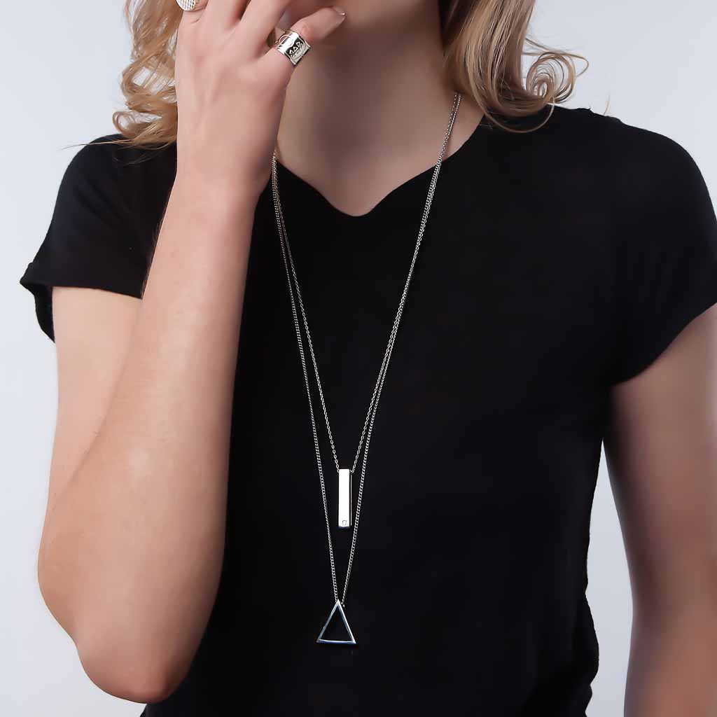 Model wearing Alpha and Triangle Elements pendant