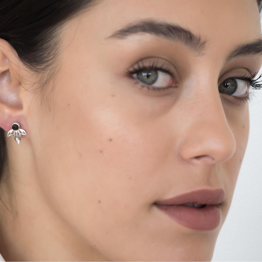 Model wearing Bloom earrings silver black spinel