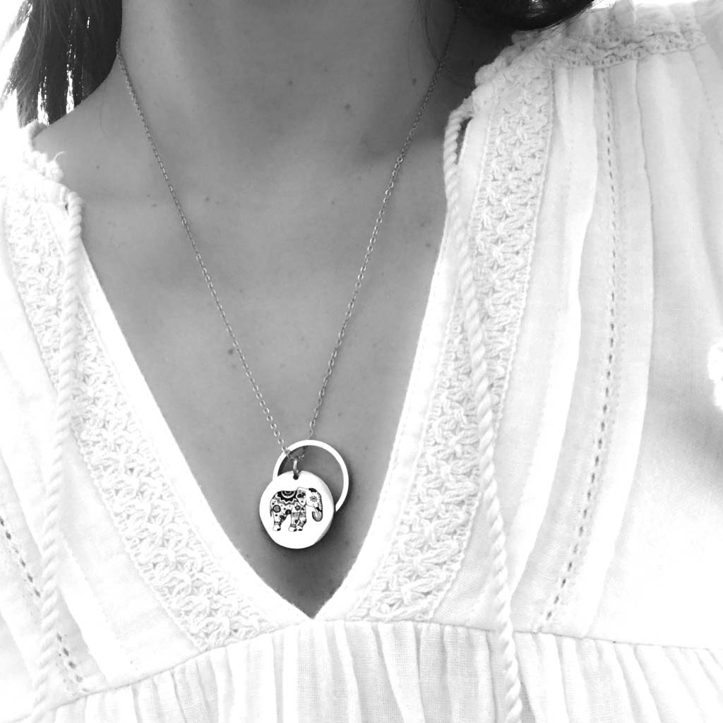 Model wearing Enchanted Elephant and Ring of Fire Rhodium short chain b+w