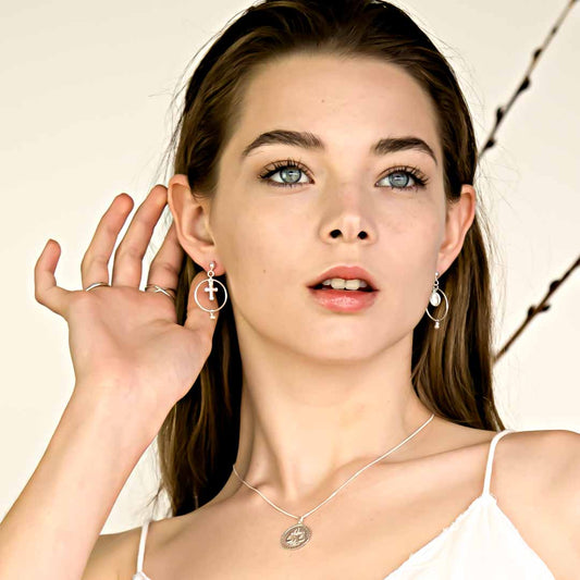 Model wearing Faith Union Earrings earrings silver