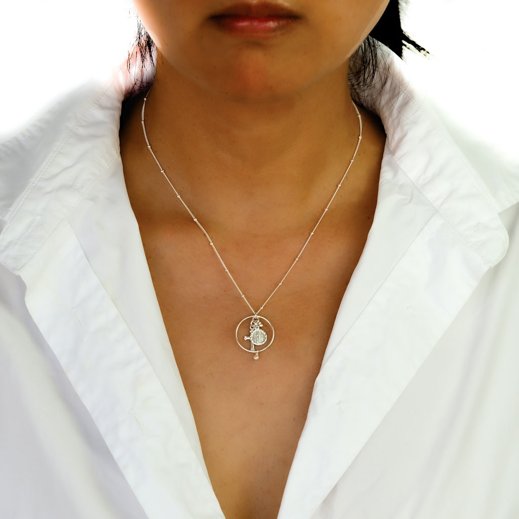 Model wearing Halo Faith Trinity Necklace - Silver