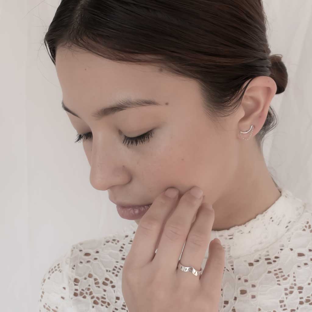Model wearing I wish ring and crescent moon earrings