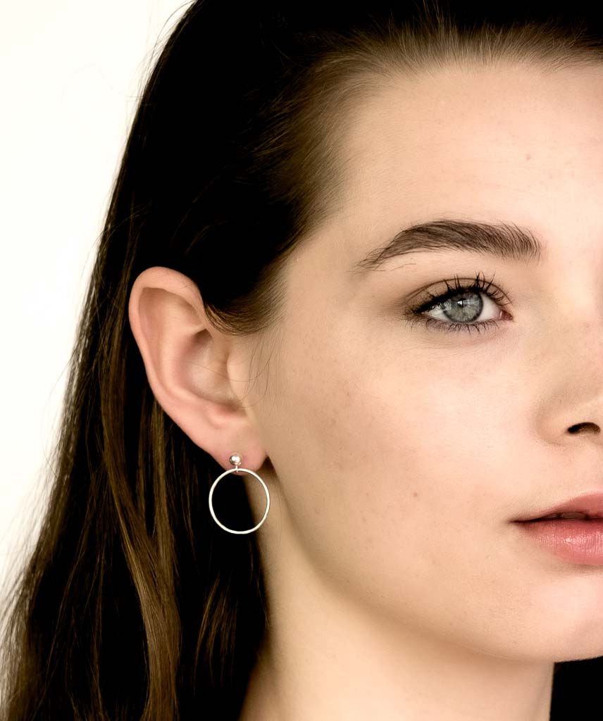Model wearing Silver Halo earrings