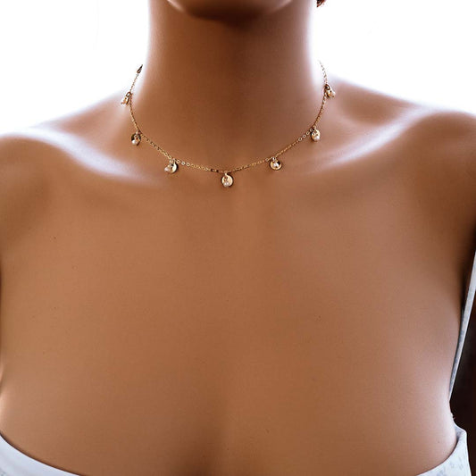 Model wearing Charmed Phoebe Necklace gold pearl