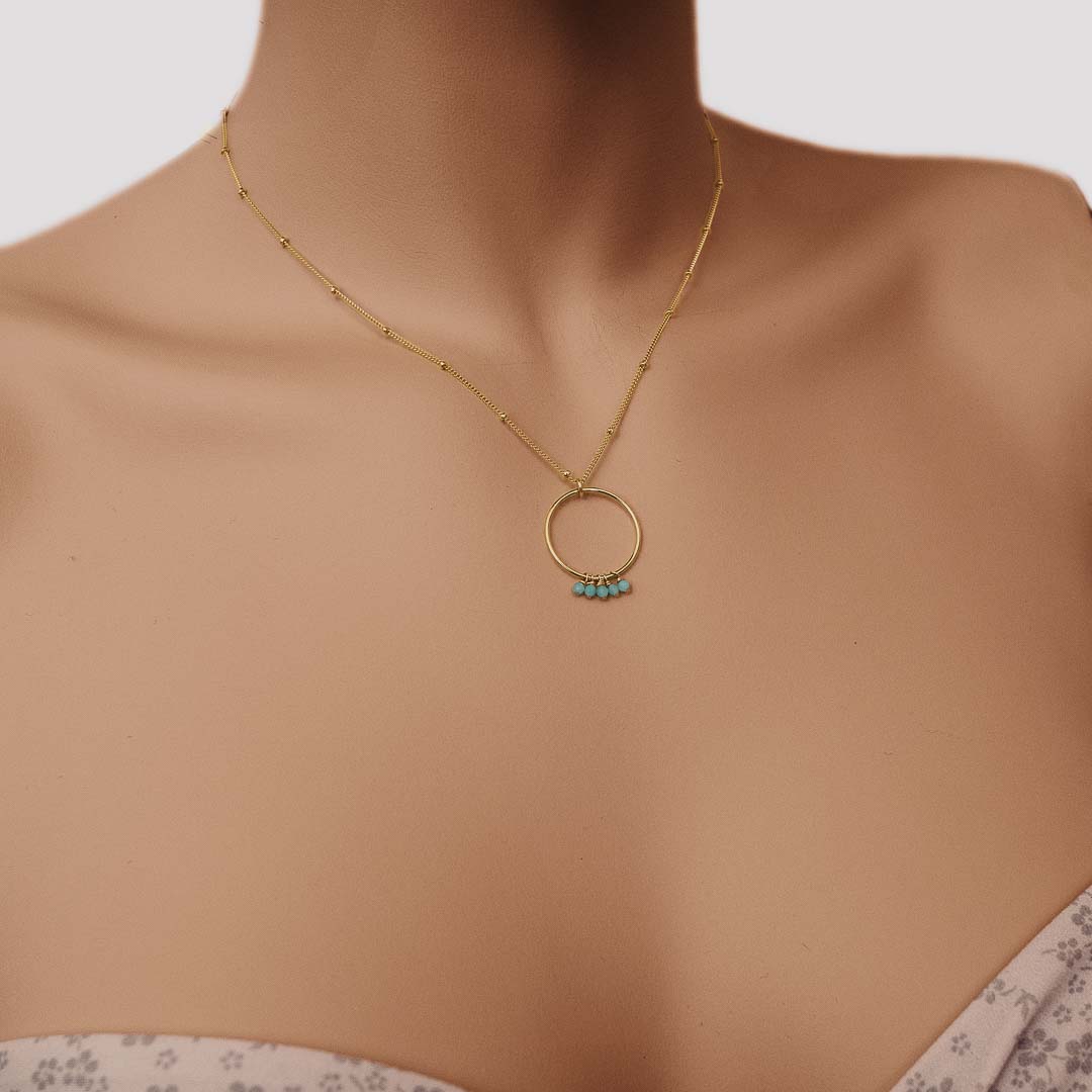 Model wearing Halo Constellation Necklace gold amazonite