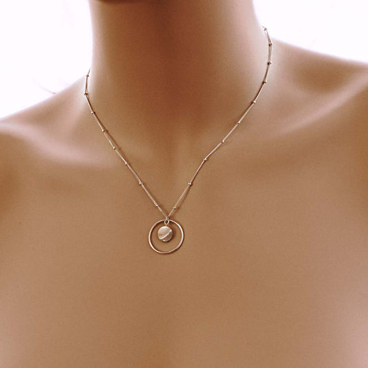 Model wearing Halo Moonglow necklace silver MOP