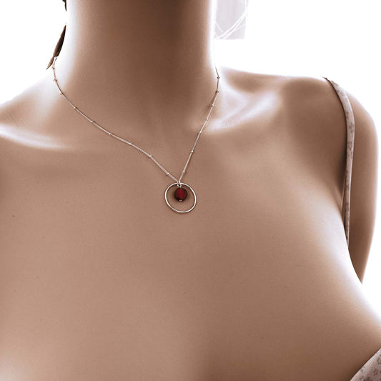 Model wearing Halo Sunrise necklace silver red agate