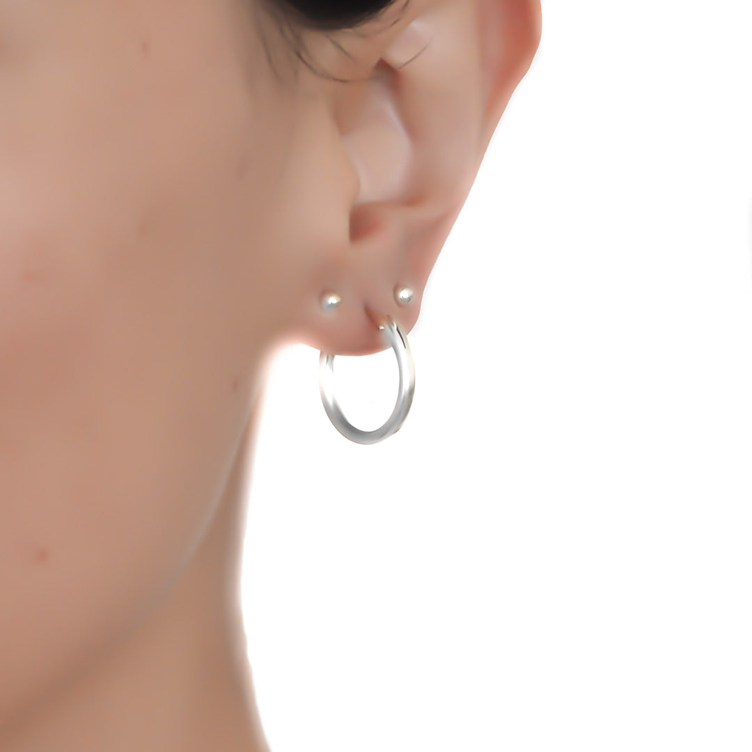 Model wearing Perfect Hoop Earrings 19mm