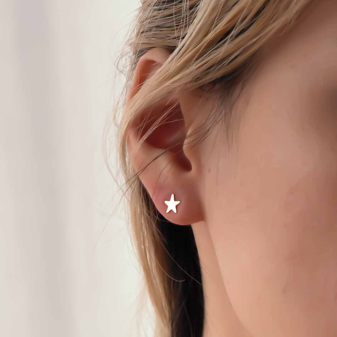 model wearing Starry Night Stud Earrings - Gold