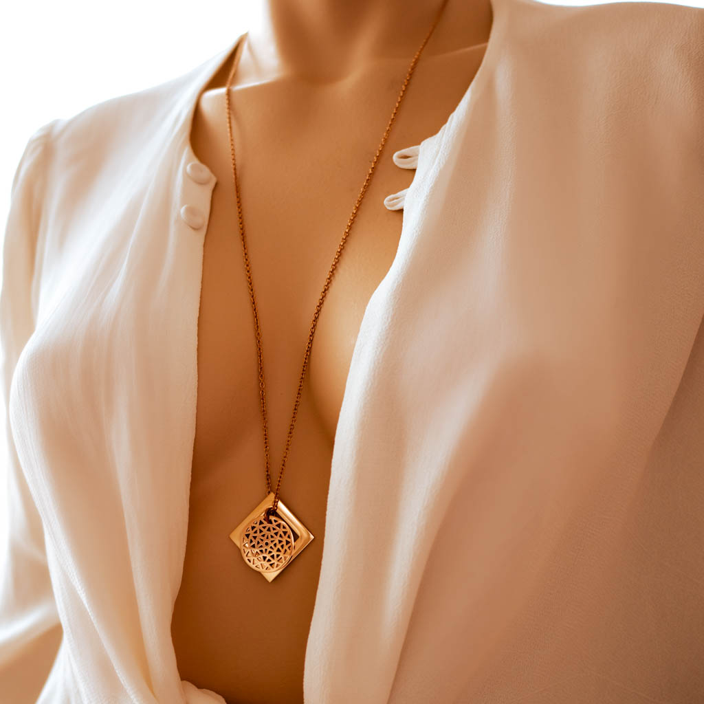 Model wearing dandelion diamond pendant rose gold long chain