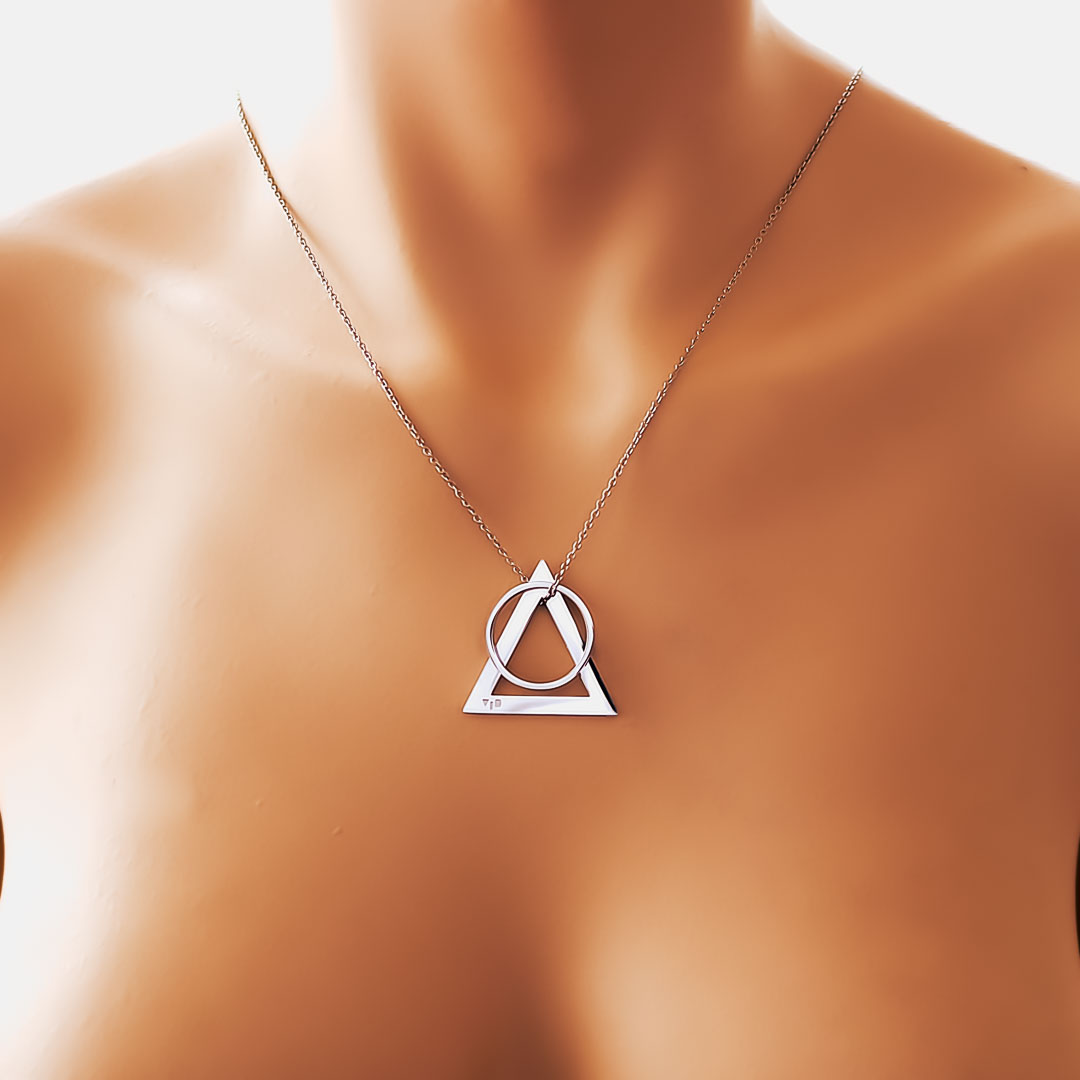 model wearing deltaglyph rof pendant rhodium short chain