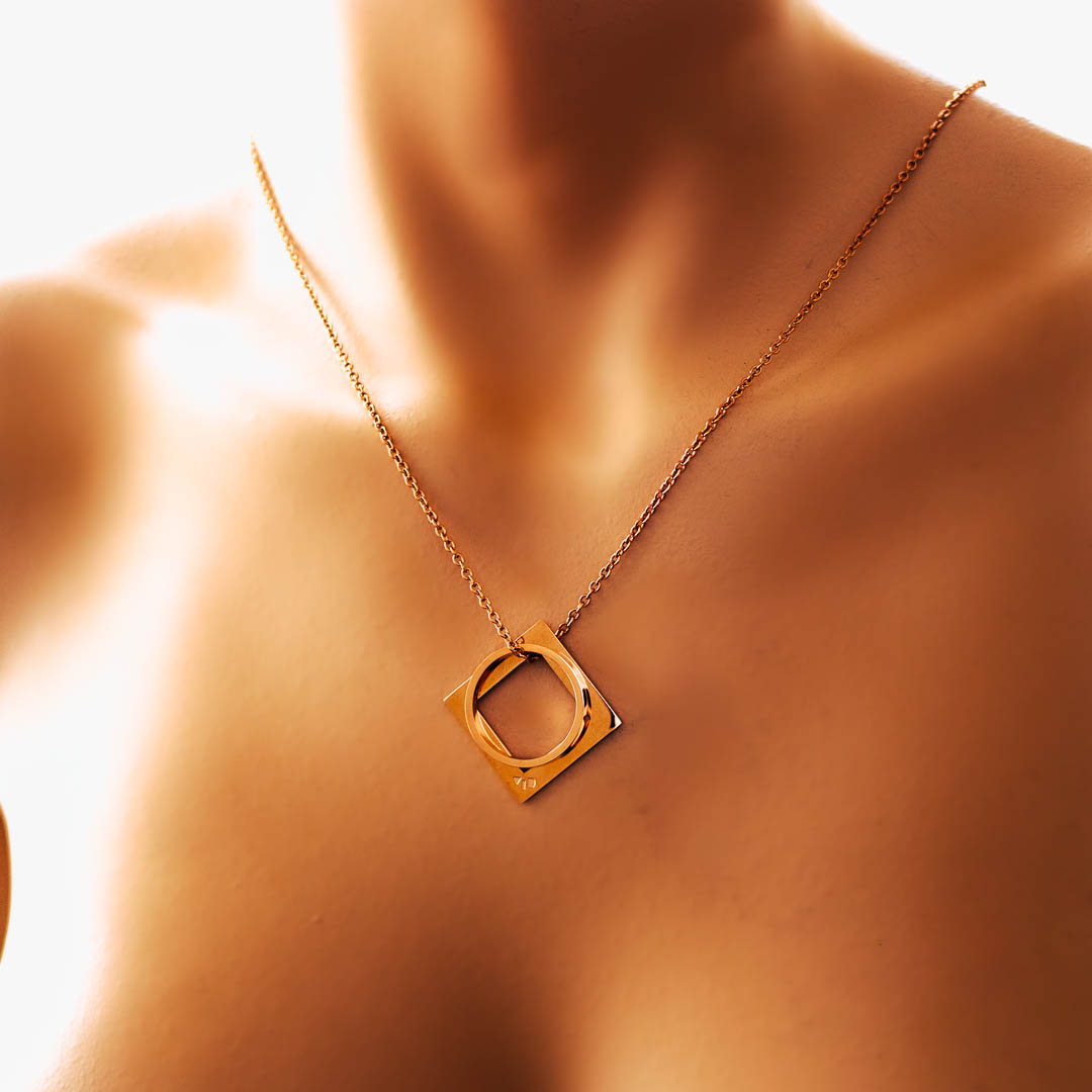 Model wearing diamond rof pendant rose gold short chain