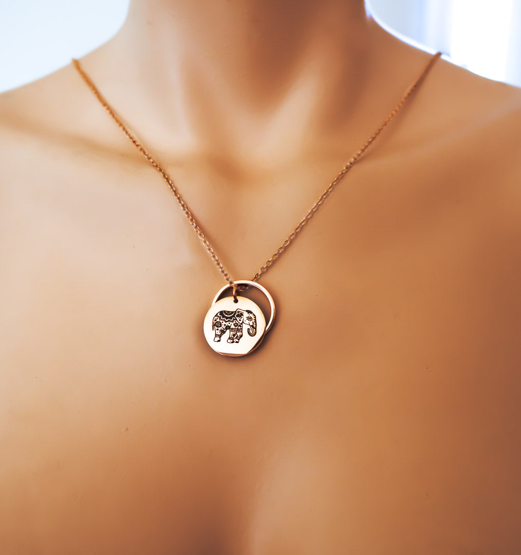 model wearing elephant rof pendant rose gold short chain