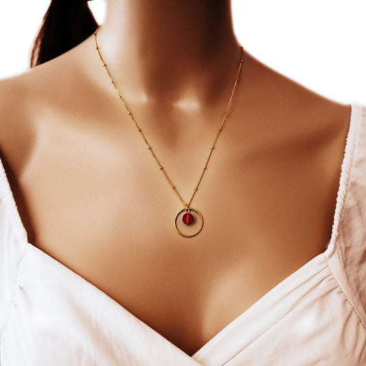 Model wearing halo sunrise necklace gol red agate