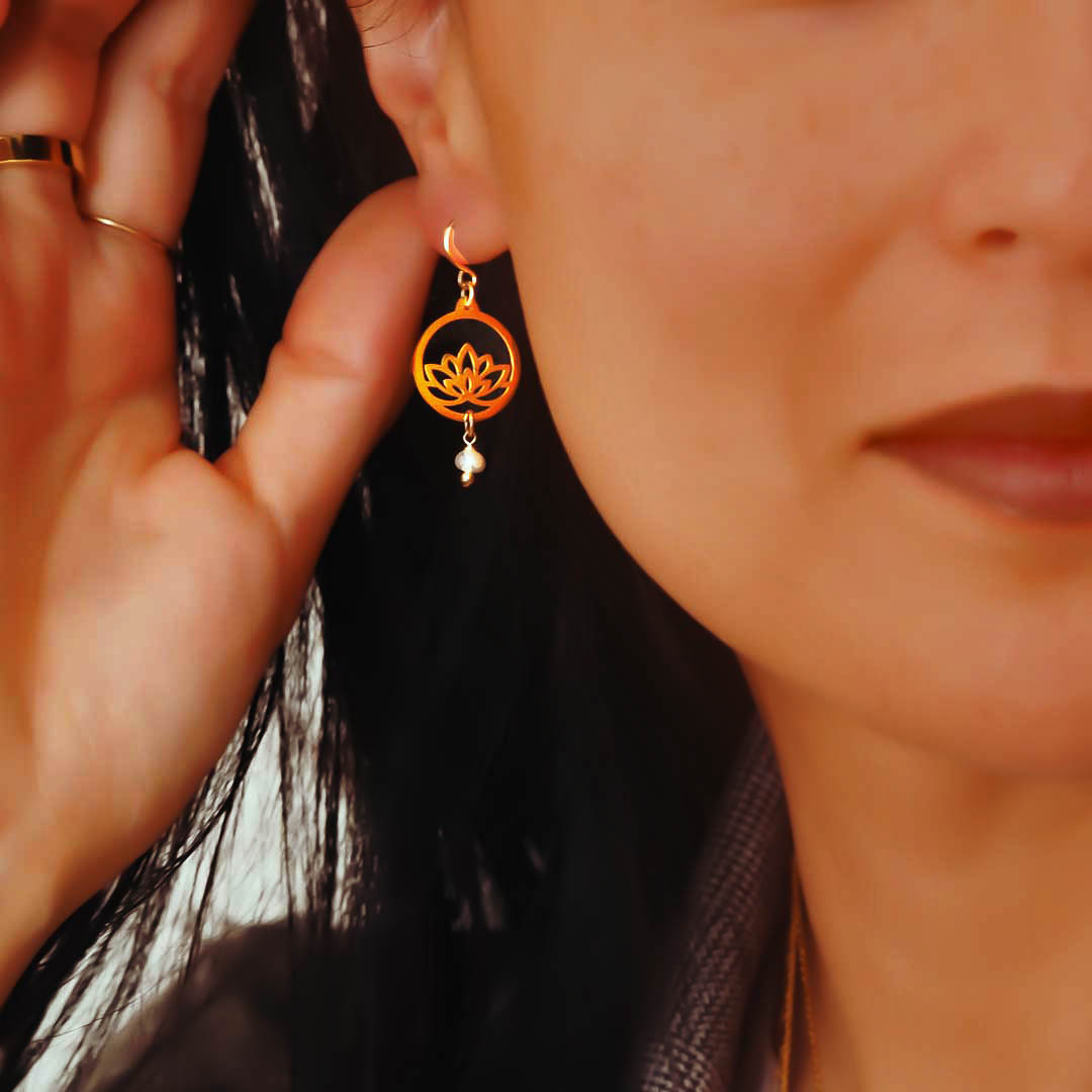 Model wearing  Lotus earrings gold pearl insta