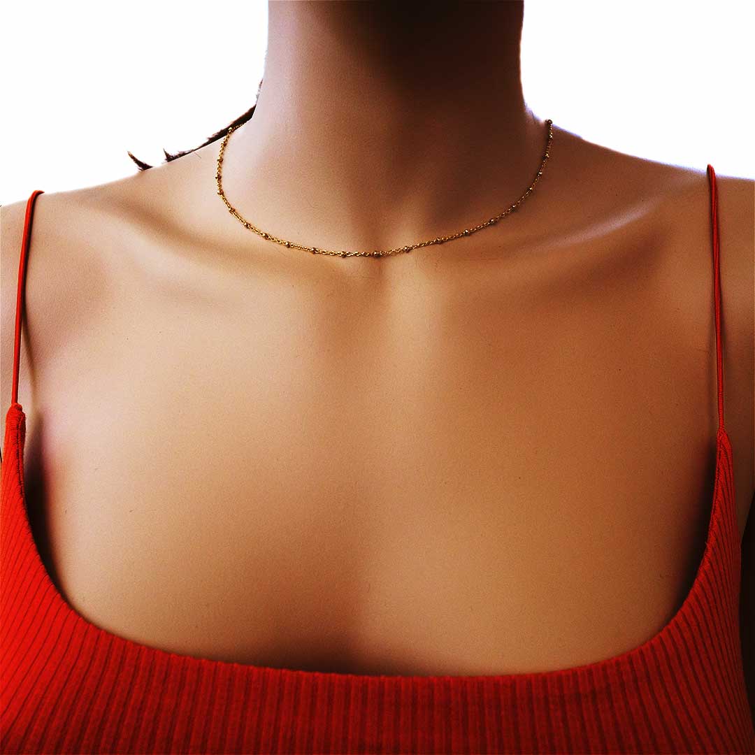 Model wearing Satellite Cable chain gold