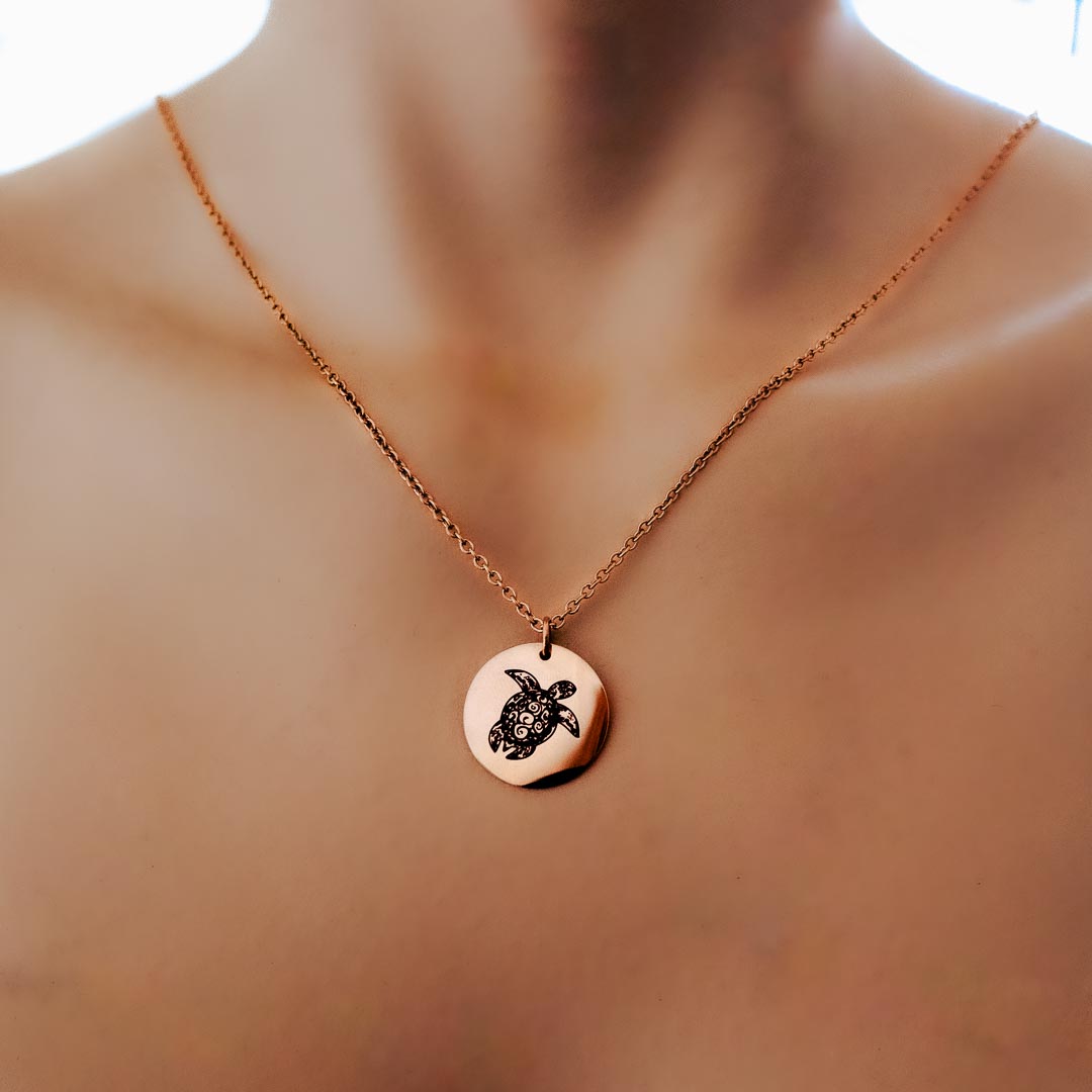 Model wearing sea turtle single pendant rose gold short chain