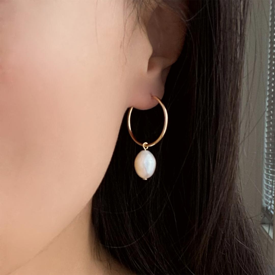 model wearing Arcadia Earrings - Gold and Pearl