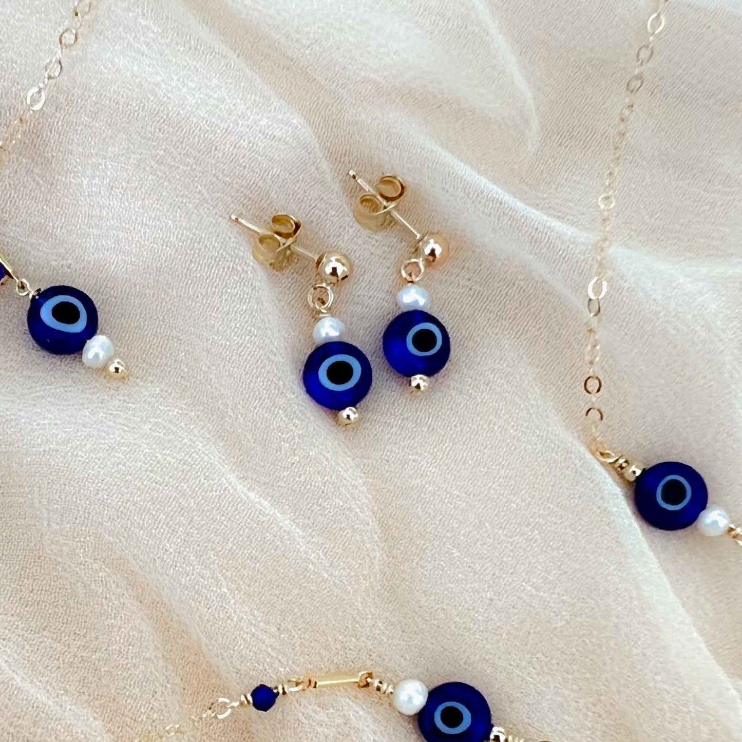 Evil Eye Drop Earrings - Gold and Pearl flatlay