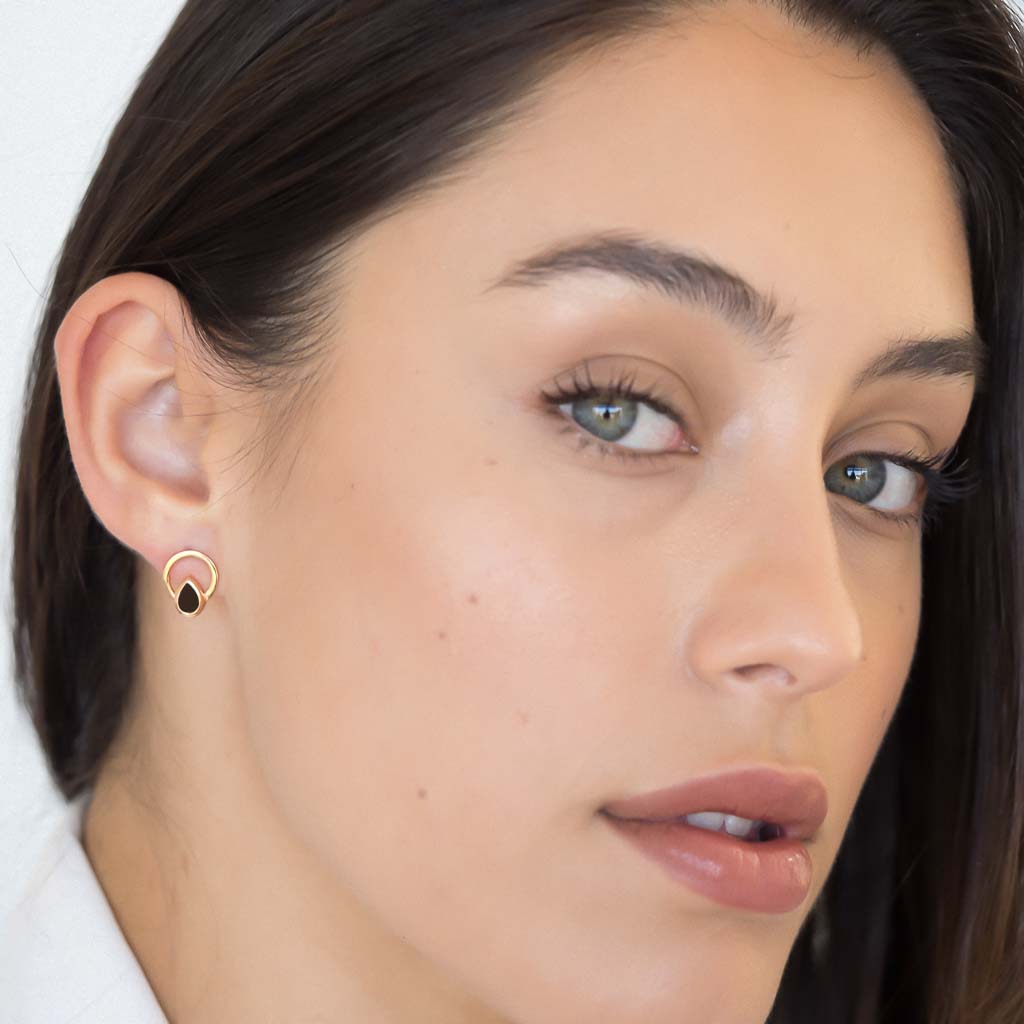 model wearing Teardrop single ray earrings rose gold smoky quartz