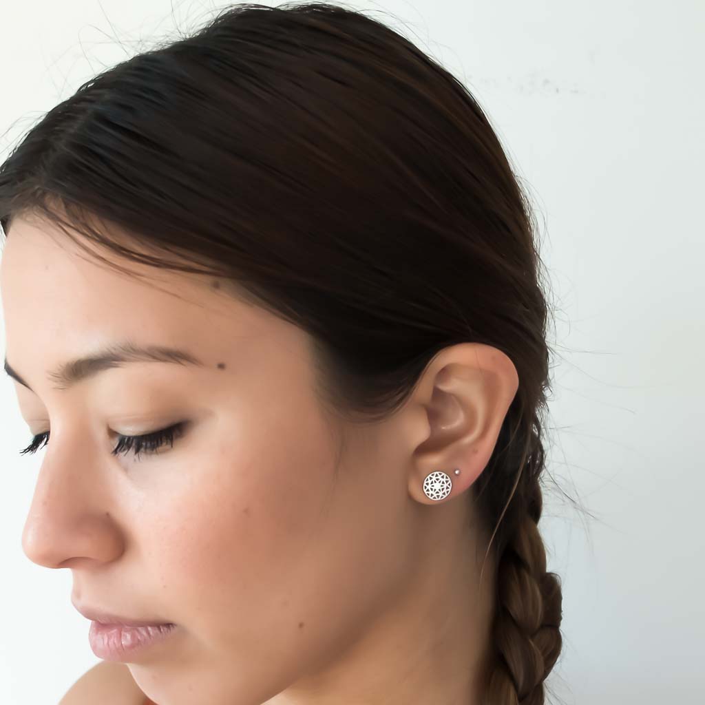model wearing dandelion stud earrings silver1