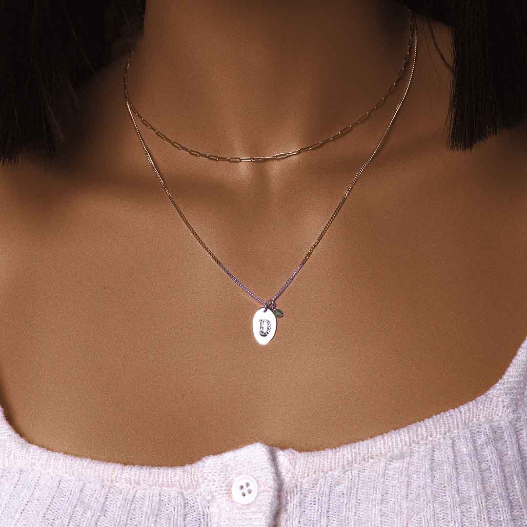 model wearing initial necklace - silver